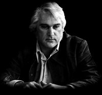 Charlie Rich:
Fast talkin', slow walkin', good lookin' Mohair Sam